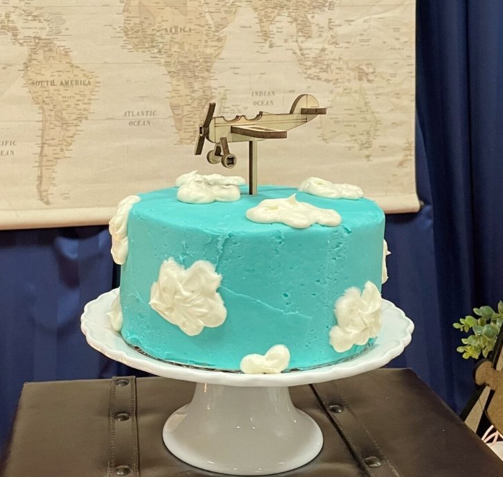 Pilot Themed Cake With Airplane And Clouds